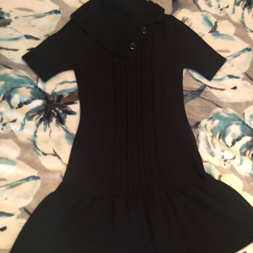 Sweater dress with button details near the neck